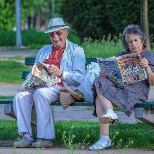 couple sitting on bench
